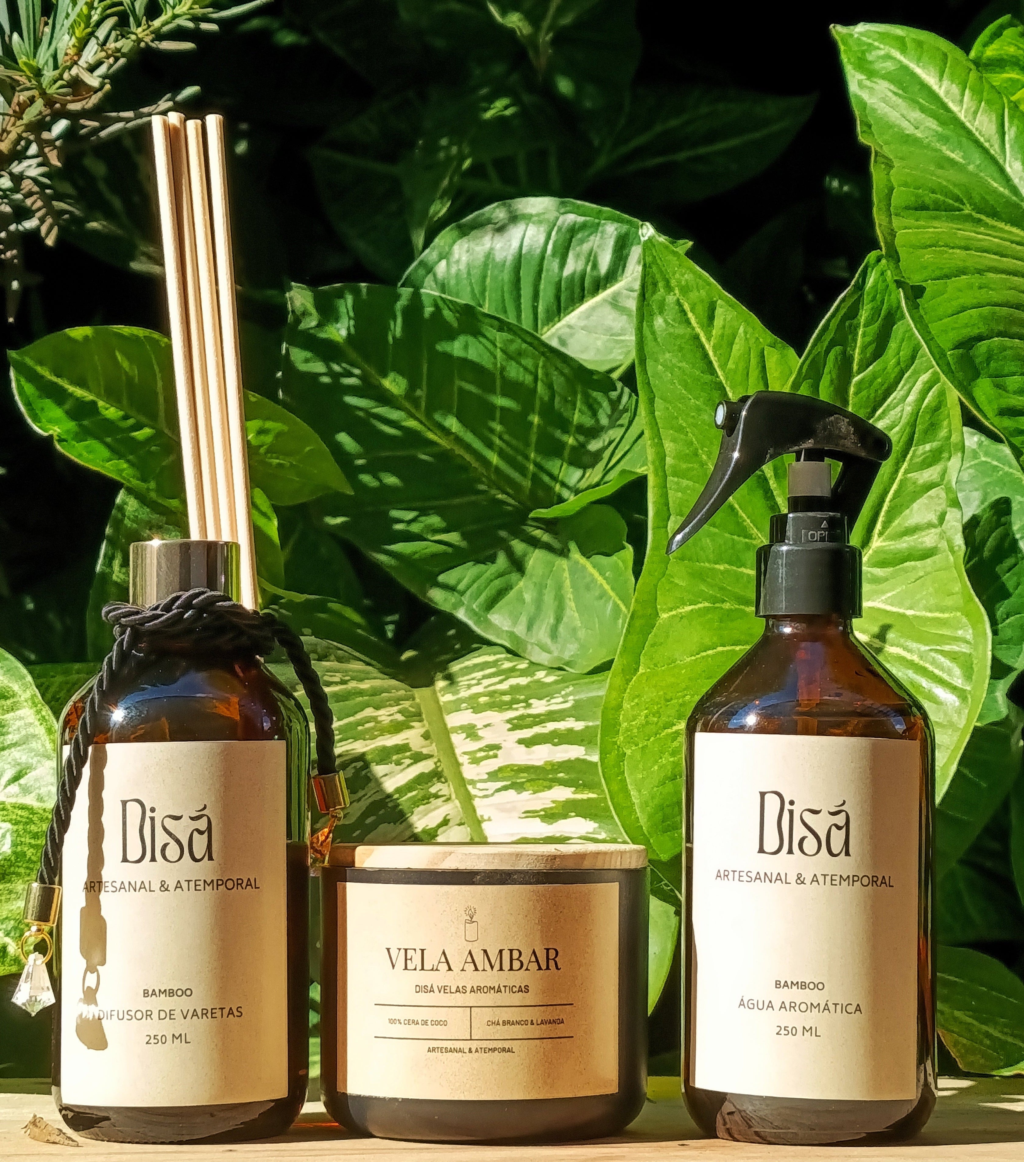 Kit Âmbar Trio – Água Aromática + Difusor de Varetas + Vela Aromática